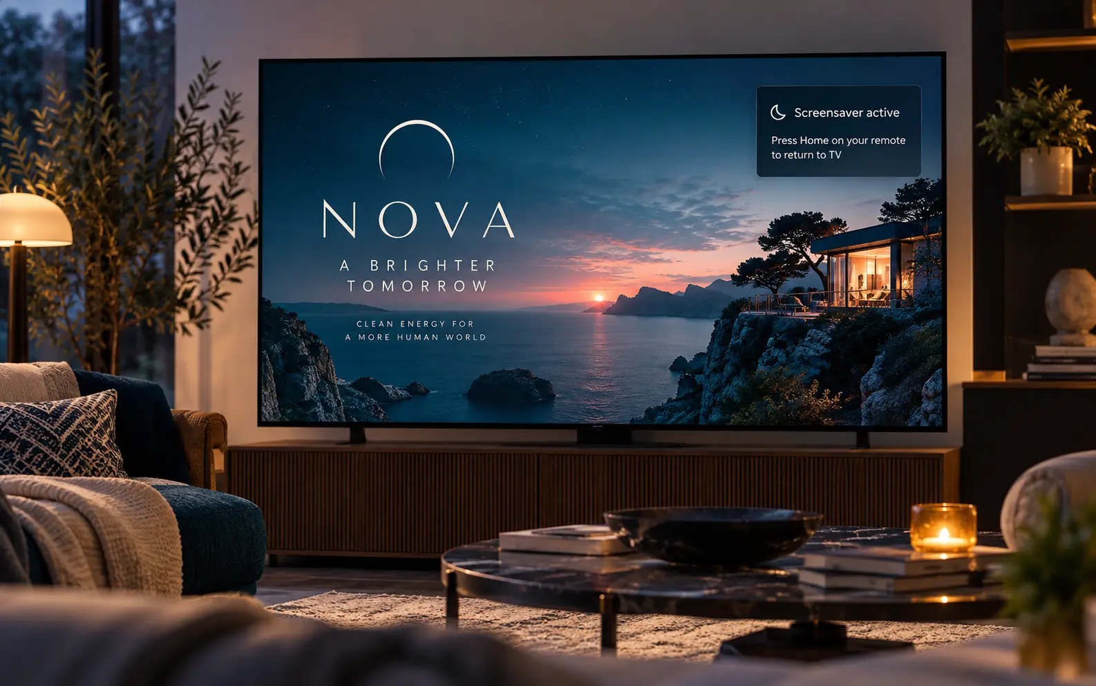 A television displaying a branded idle screensaver with a Screensaver active notice and instructions to return using the remote.